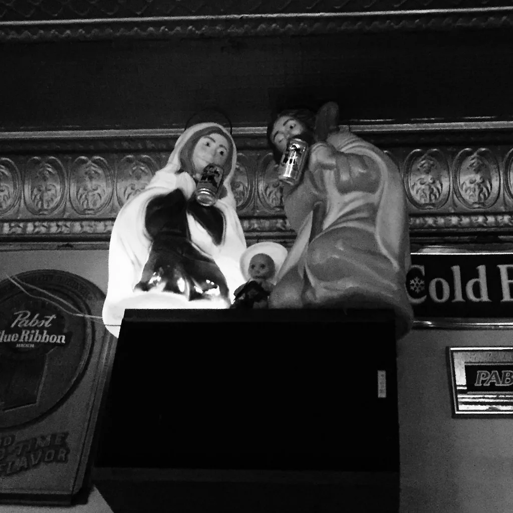 A beer-can nativity scene on a speaker inside L&L Tavern